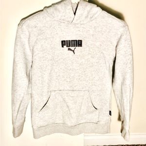 It is sweat shirt for kids it has slaver color